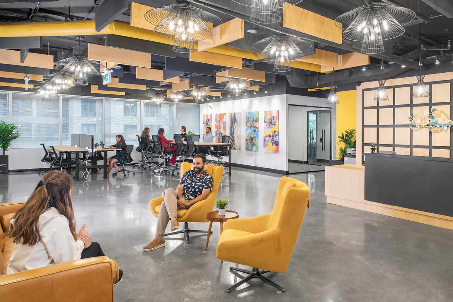 Members working together in a Venture X Canada common area